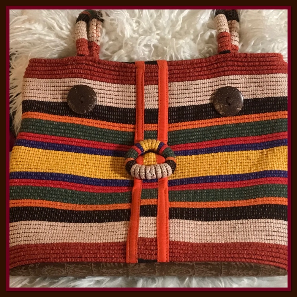 Mid size handbag. Maker unknown